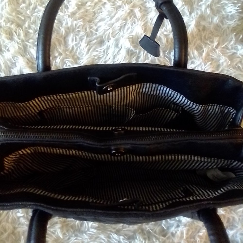 It's an hand bag purse christian siriano